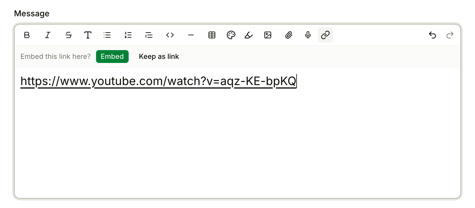 The message editor after pasting a YouTube link, with the Embed this link here? prompt and its Embed and Keep as link buttons