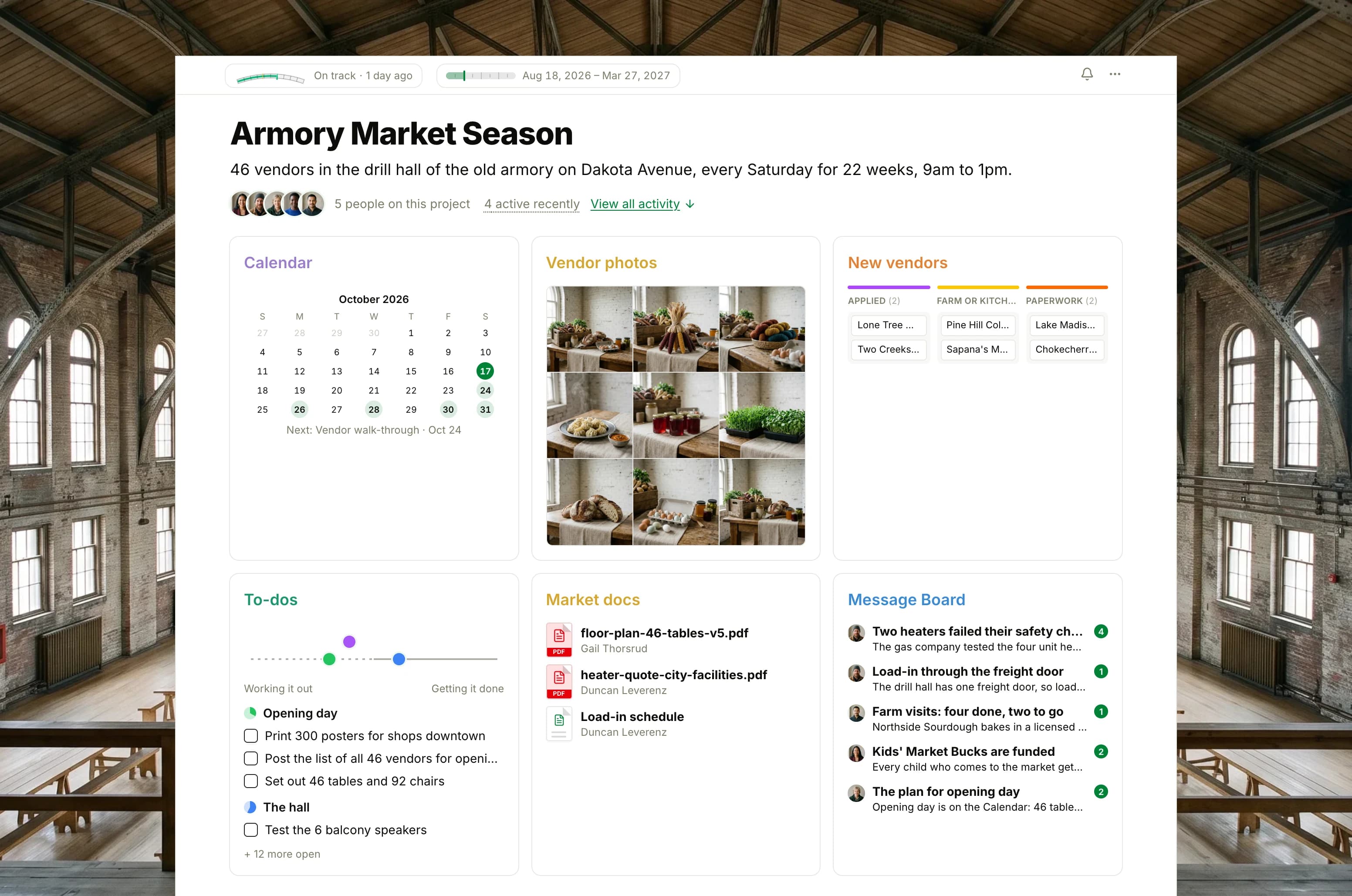 The Armory Market Season project in Thicket over a photograph of a brick armory drill hall with rows of empty market tables: the health flag reading On track, the season's dates and five people, then six cards: the Calendar with the vendor walk-through next, Vendor photos as nine photographs of vendors' goods on one oak table, the New vendors board with cards in Applied, Farm or kitchen visit, Paperwork and Table assigned, To-dos with three lists on the progress chart, Market docs with the floor plan, the heater quote and the load-in schedule, and the Message Board with the failed heaters on top.
