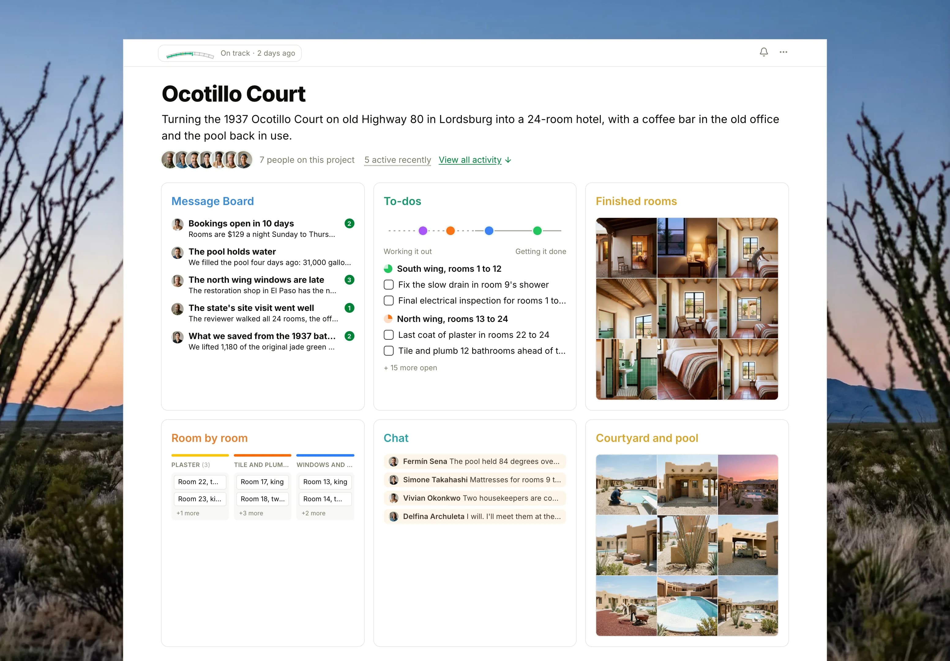 The Ocotillo Court project in Thicket over a photograph of the New Mexico desert after sunset: the health flag reading On track and seven people, then six cards: the Message Board with bookings opening on top, To-dos with four lists on the progress chart, Finished rooms as nine photographs of the restored guest rooms, the Room by room board with cards in Plaster, Tile and plumbing, Windows and doors and Furnishing, Chat between the builder, the owner and the staff, and Courtyard and pool as nine photographs of the courtyard work.